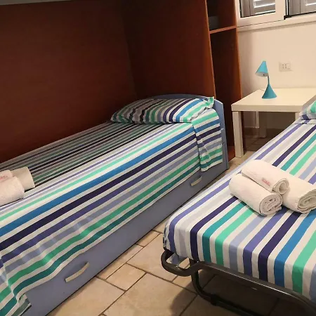 Travelliving - Ida, Beachfront Apartment Punta Braccetto